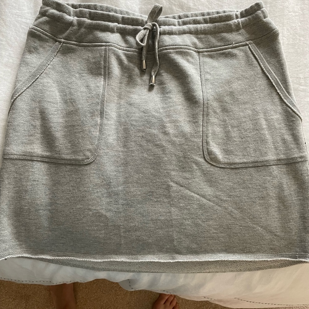 Super comfy casual skirt. Draw string at waist. No stains. Sweatshirt material